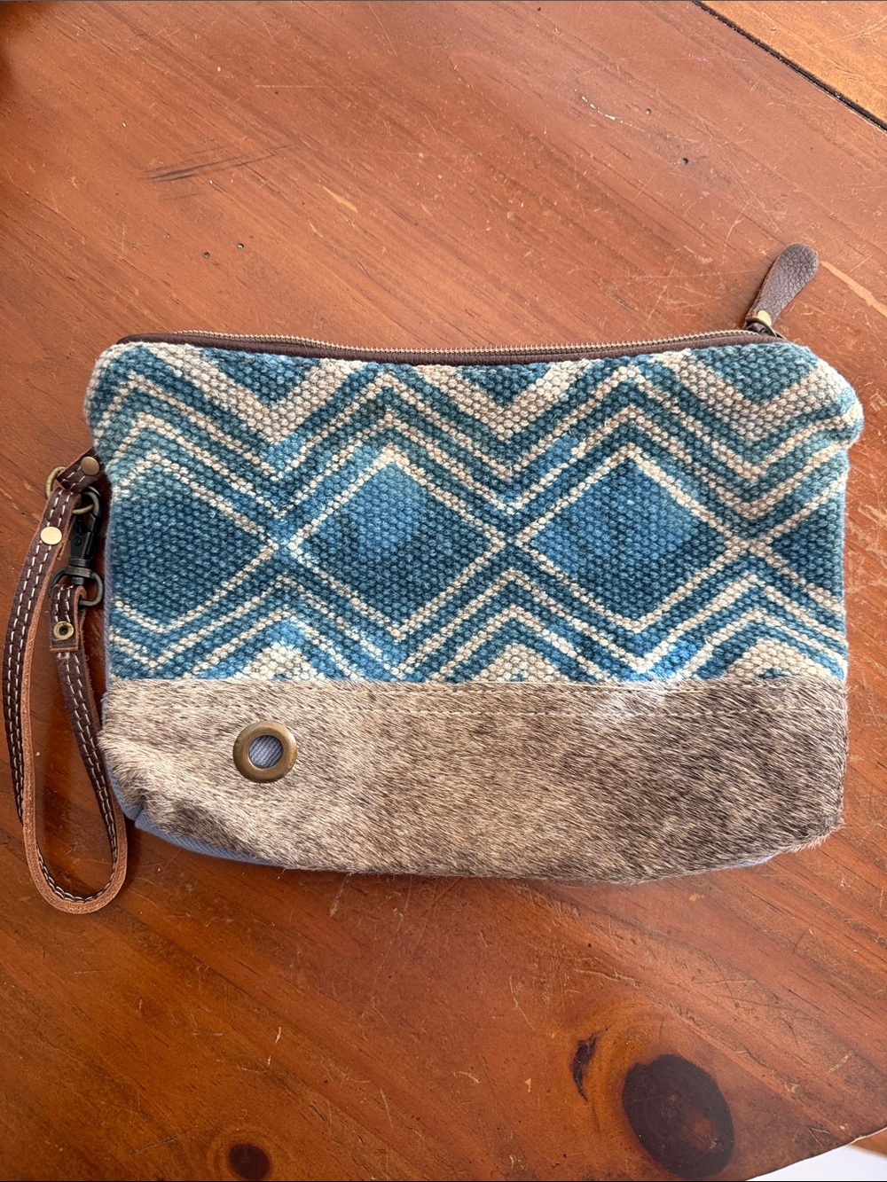 Like New Myra Bag in deep blue and tan with animal hair bottom